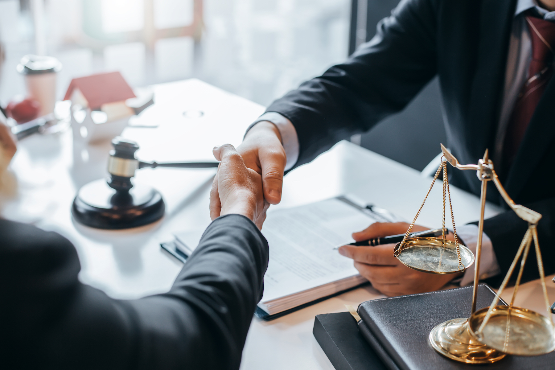 Shaking hands at a wrongful death law firm in Baton Rouge